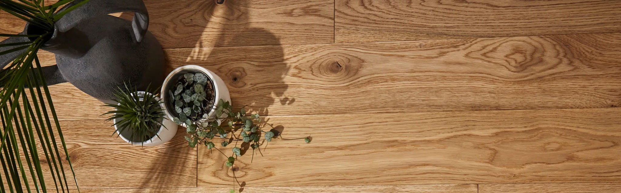 Light oak hardwood flooring with rustic styling in an Edinburgh home
